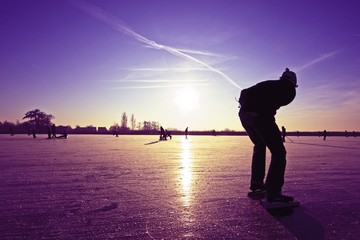 Lonely ice skater in the Netherlands