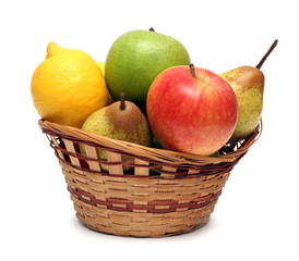 basket with fruits isolated on white