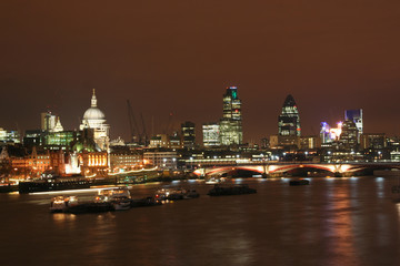 The Thames at night, with St. Pauls cathedral and the City