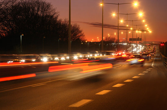 Fototapeta cars at night with motion blur