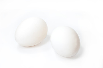 Two white eggs on white