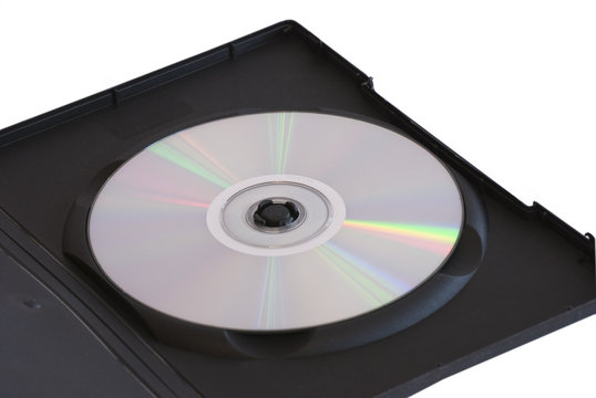 DVD-disc in open box over white background isolated