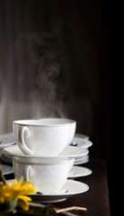 Fancy cups filled with hot coffee or tea