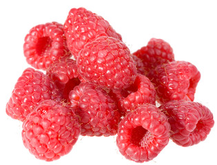 pile of raspberries isolated on white background