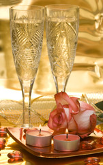 celebration table, rose and glasses with champagne