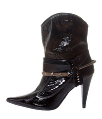 Short black shine boot for women isolate on white