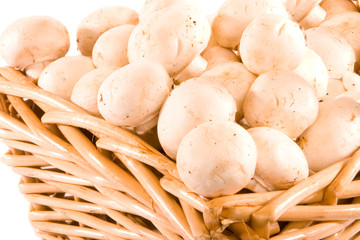 Button Mushrooms in Wicker Basket