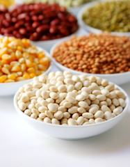 Display of food grains in white bowls