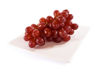 Red Grapes on a White Square Plate