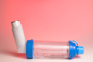 An asthma inhaler with an extension tube