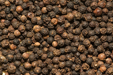 Background of black pepper - extreme close up