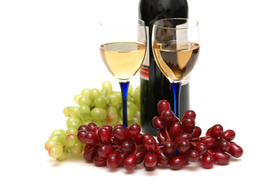 Grapes and wineglasses isolated on the white
