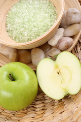 bowl of apple bath salt and some fresh fruits