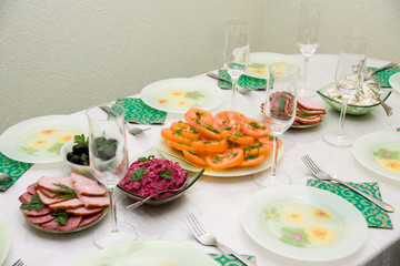 Festive dining table and much tasty meal