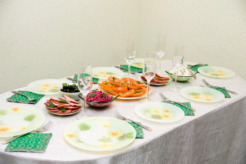 Festive dining table and much tasty meal