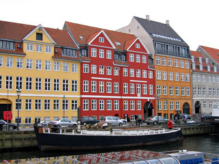 Copenhagen - houses and boats in the water front of the canals