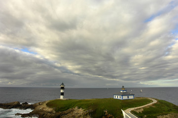 Fototapeta na wymiar small lighthouse at the coast of north of spain