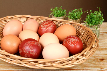 Ornate, traditional decorated Easter eggs and green cress