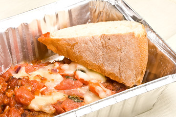 carry out meal chicken parmesan with a slice of bread 