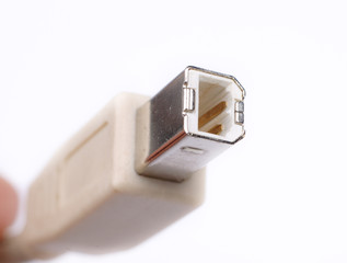 usb printer cable jack close up with white background