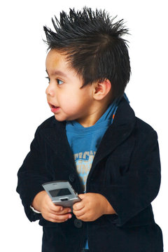 Hispanic Child Dialing On Cell Phone