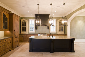 opulent kitchen in complementary colors with granite island