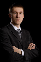 caucasian male person in business suit on black