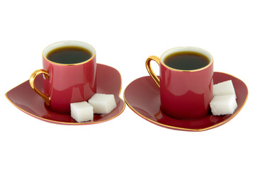 Two Crimson Heart-Shaped Cups of Coffee Isolated on White