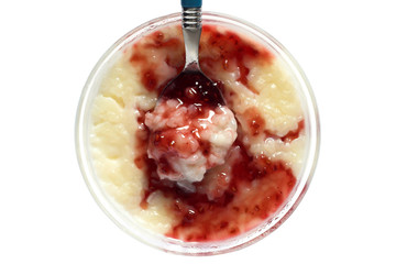rice pudding served with raspberry jam