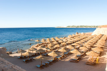 a morning beach in Egypt and sea coast with a strip of corals