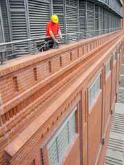 electrician fixing a bulb-holder
