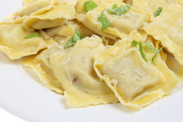 Ravioli pasta, served with parmesan, olive oil and basil