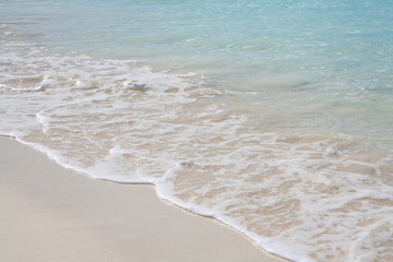 Fototapeta na wymiar Crystal clear beach with nice blue water