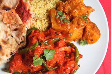 Chicken curry with rice, Bomabay aloo and keema naan