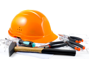 Yellow hard hat and working tools