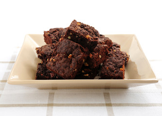 Homemade chocolate brownies served on a plate