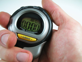 Hand with Digital Stopwatch