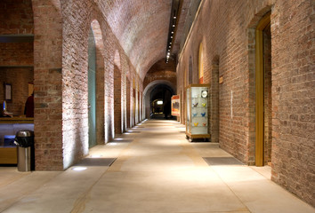 Looking down corridor in ancient building 