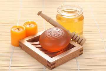 bar of gliceryne soap and jar of honey - natural bath