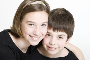 brother and sister in black and white isolated on white