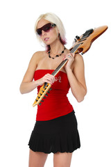 Fototapeta premium Blonde girl holding a guitar isolated on white
