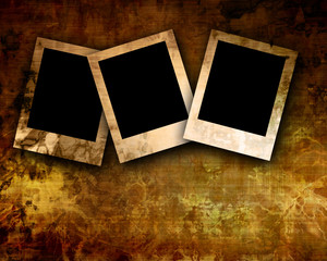 Polaroids on old background.