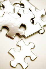 Jigsaw puzzle pieces over white