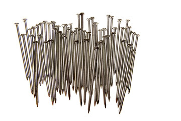 Steel nails over white background
