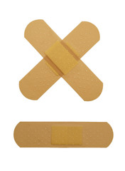 Crossed bandaid isolated over white