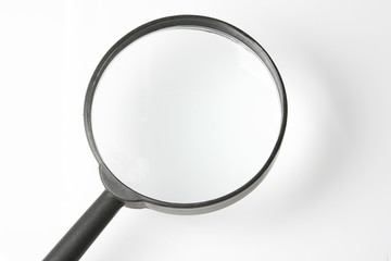    magnifying    glass    on   the     white     background