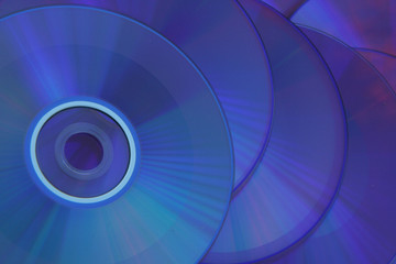 CD's that are used as a blue background