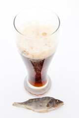 dark foamy beer with dried fish