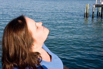 Beautiful plus sized model soaking up the sun on vacation.