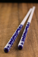 Chopsticks on a wood cutting board